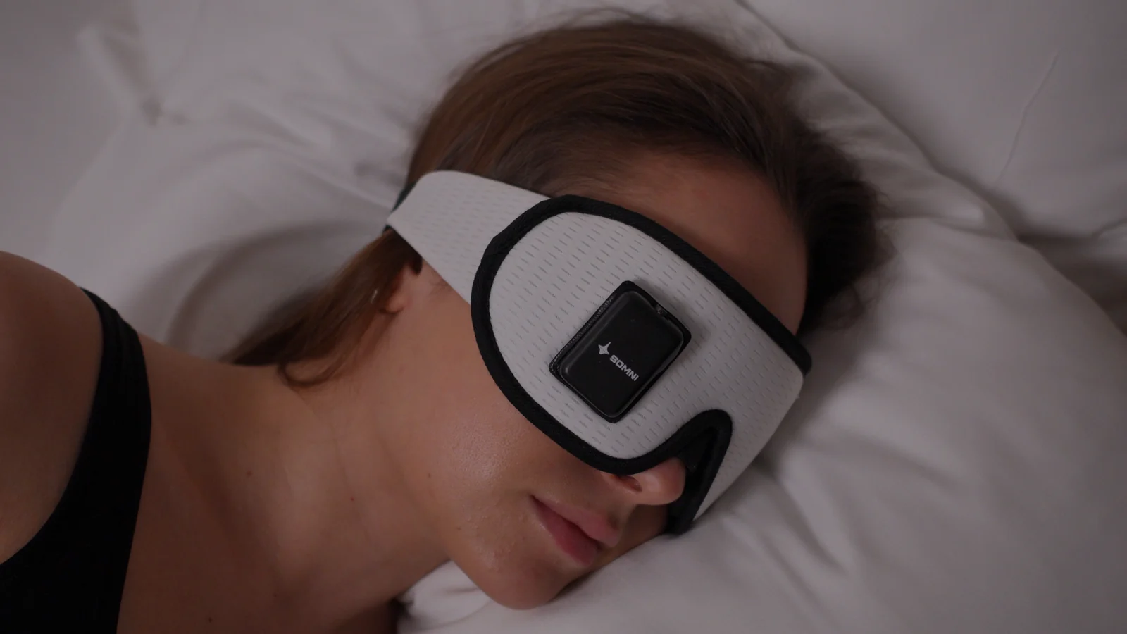 Somni Mask worn while lying on one side